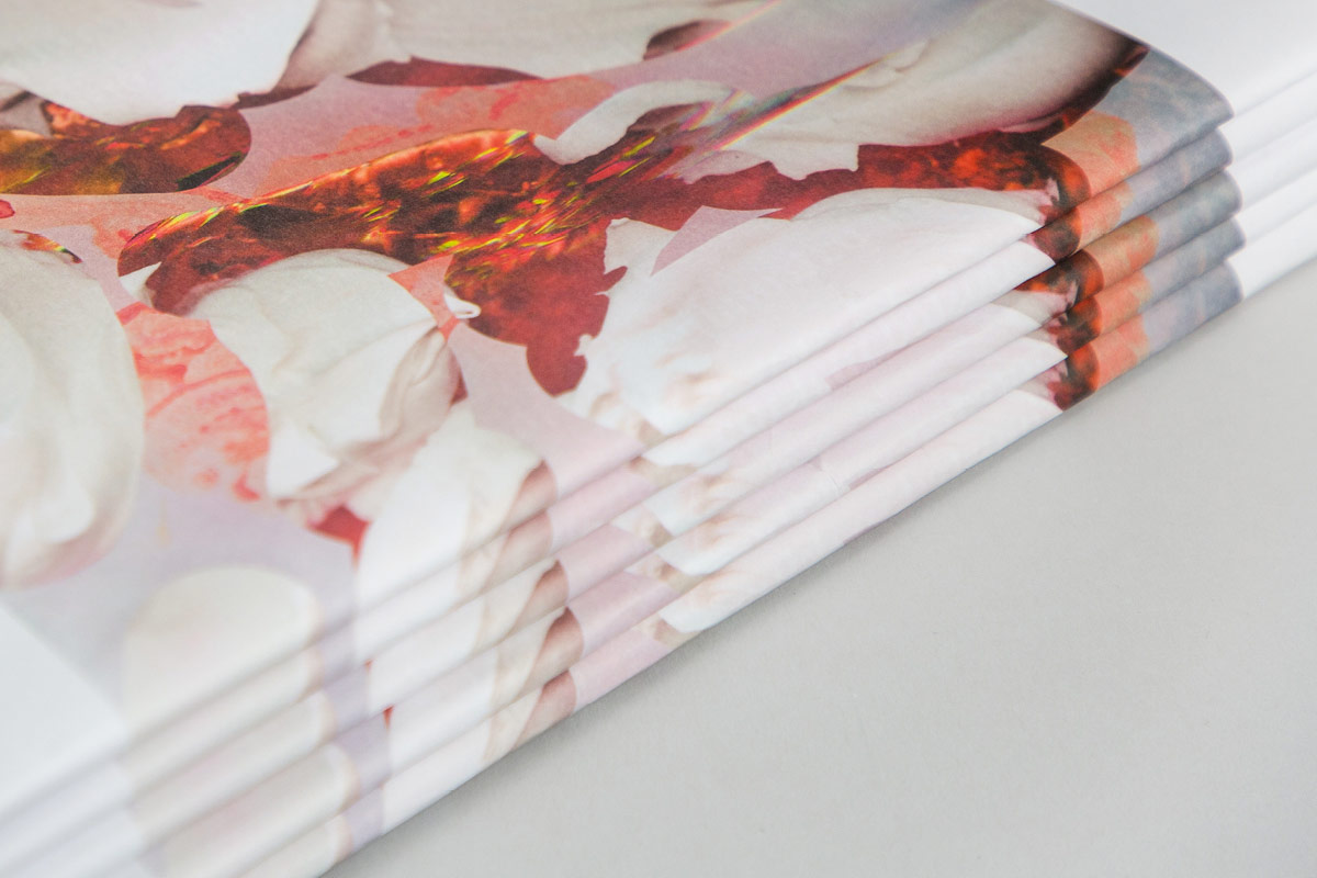 Close up of a stack of Applause magazines