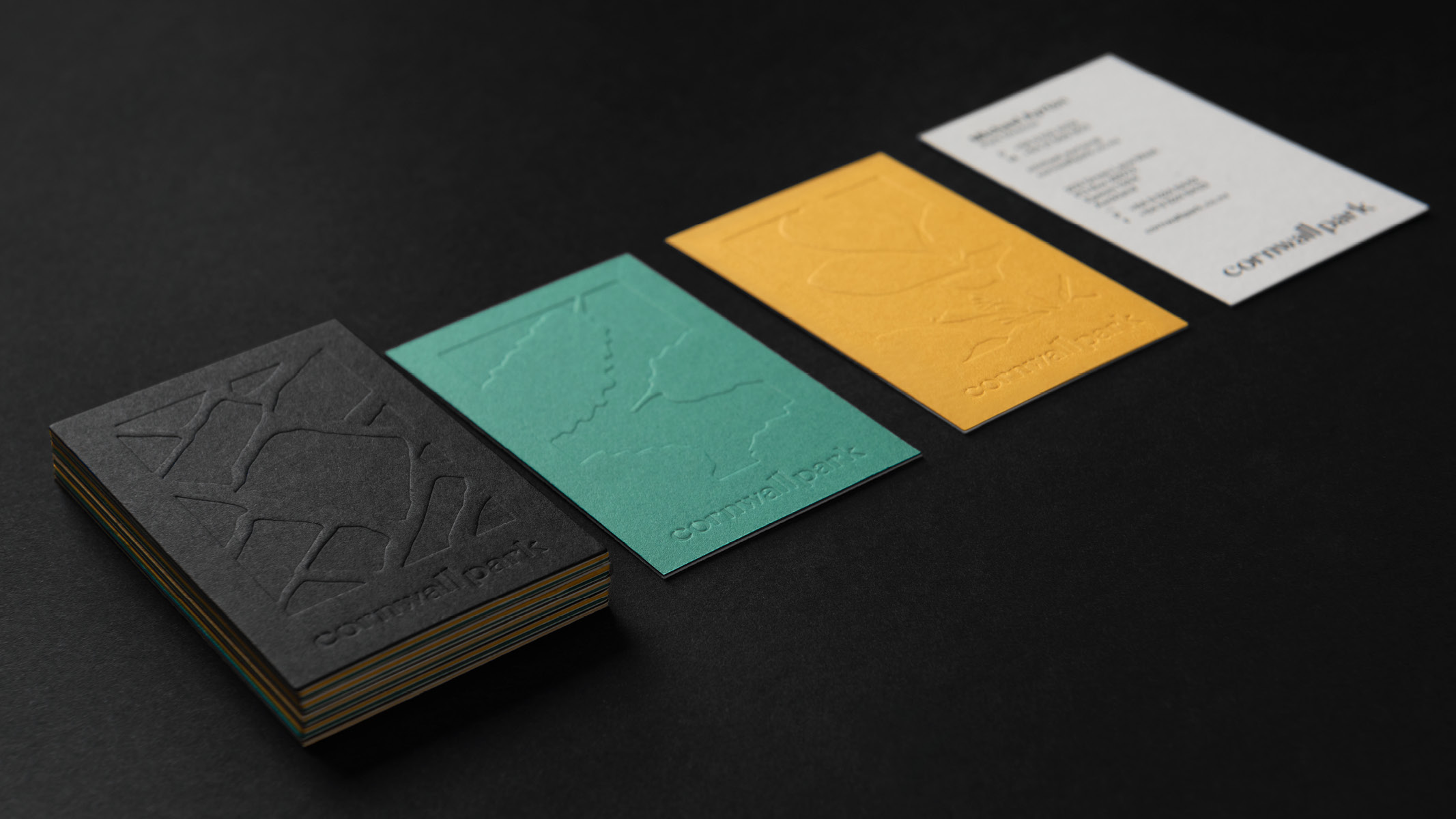 Business cards of various colours