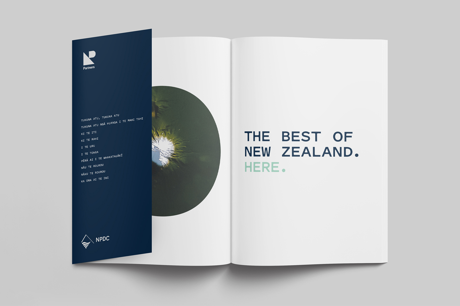 Open booklet with photo of Mount Taranaki along side text