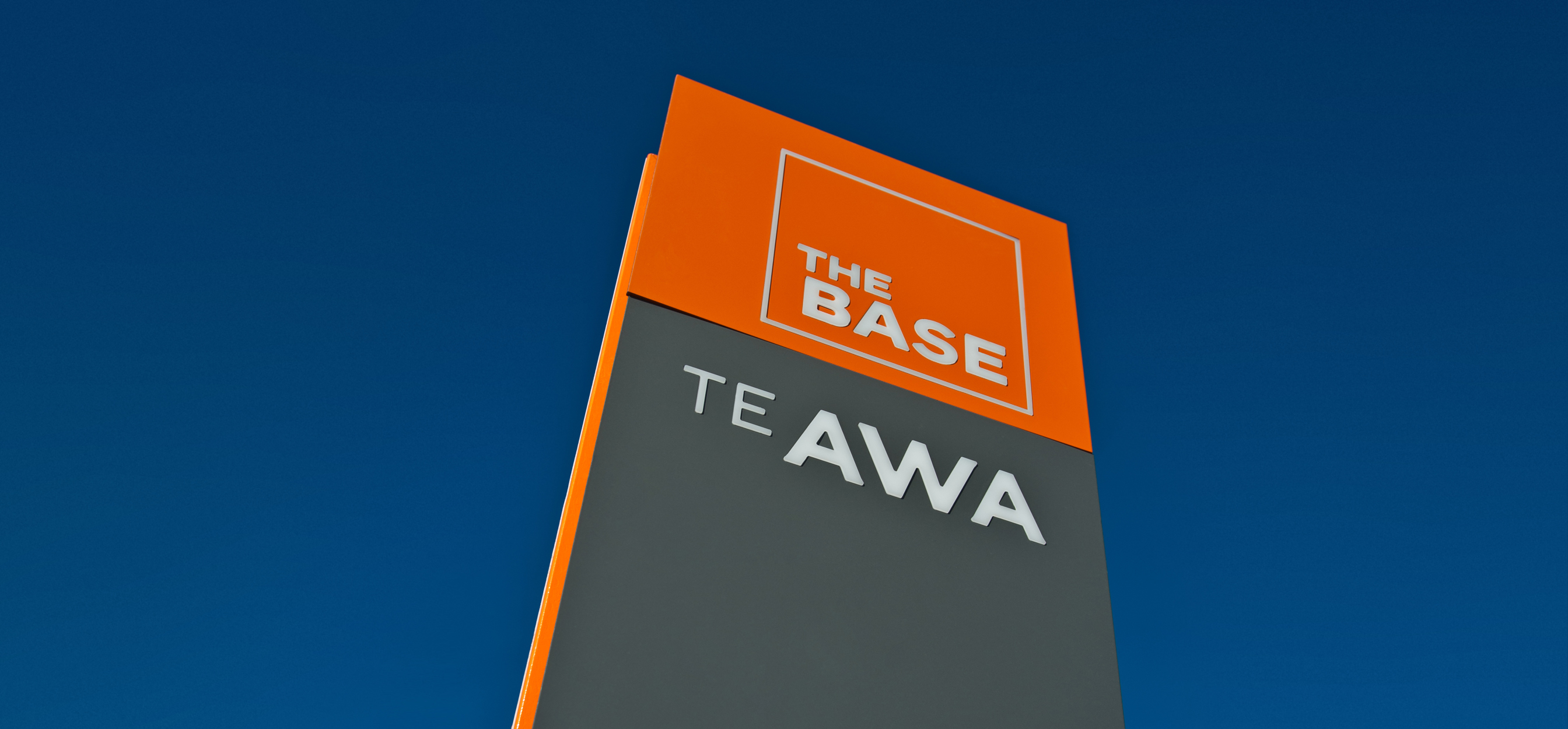 An exterior sign for The Base and Te Awa