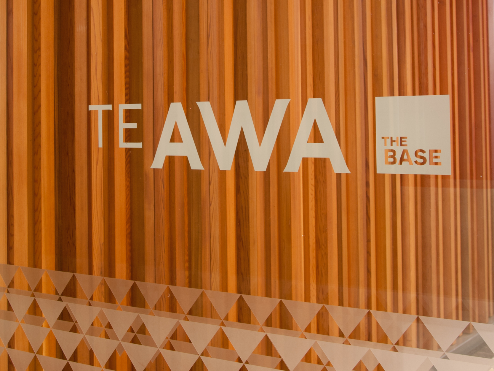 Te Awa and The Base logo on a window